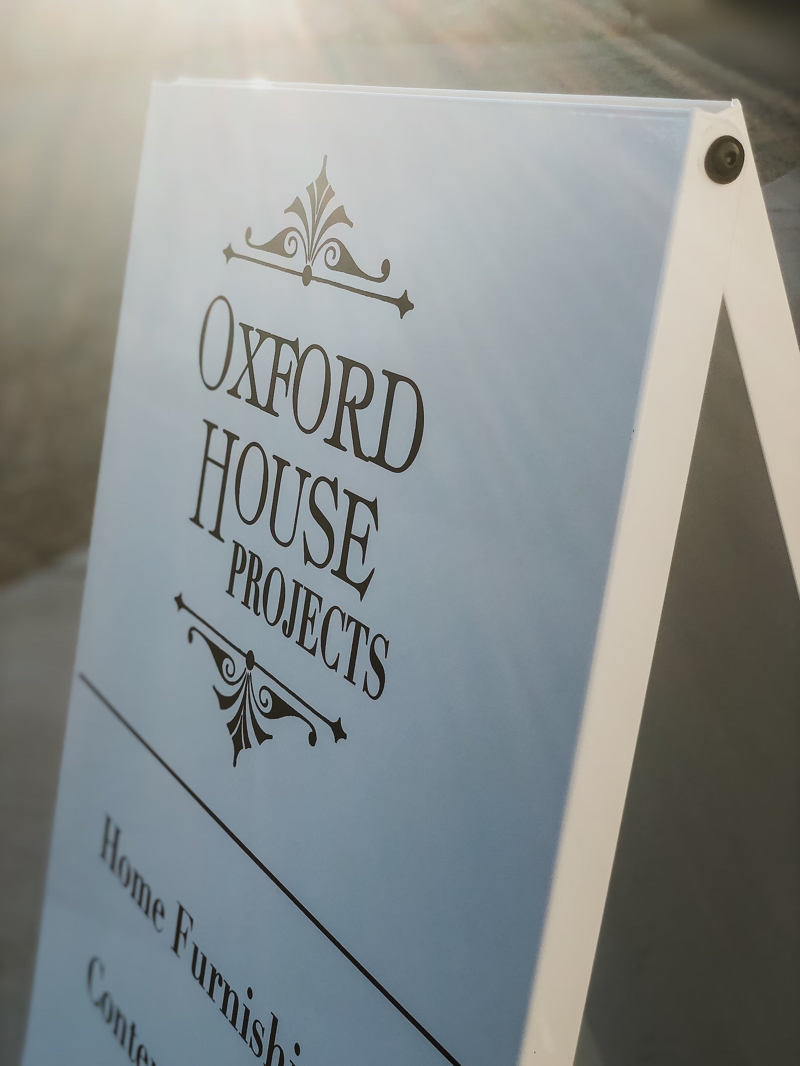 Close up view of sandwich board sign in an aframe style